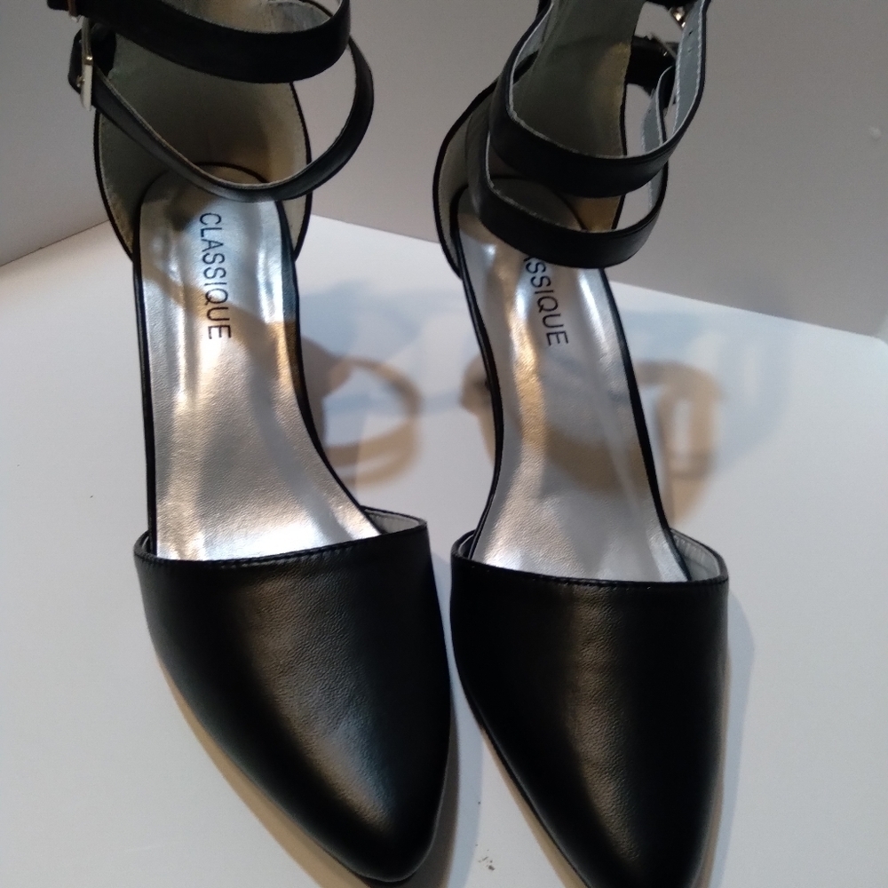 Classique black heels. 2.5 inch heel. New without tags.